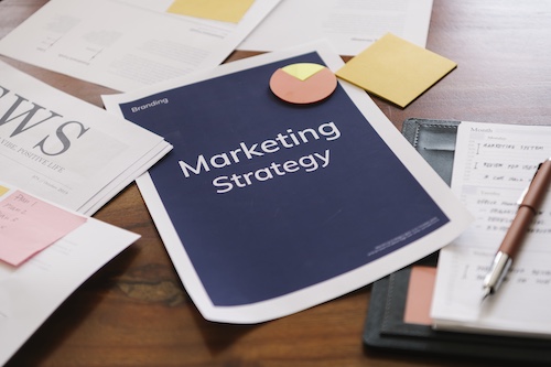 Marketing strategy report on a desk